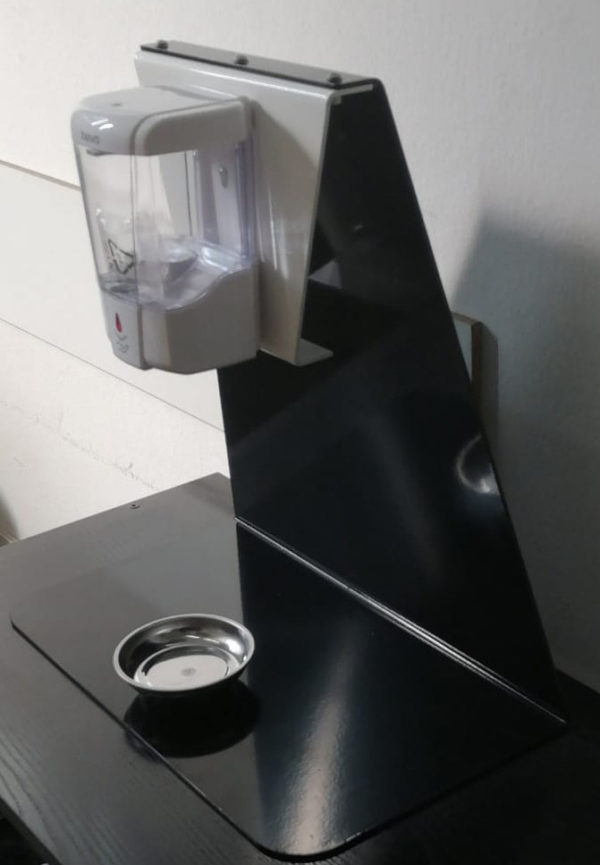 Supporto dispenser automatico da banco con salvagocce